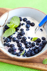 Fresh yogurt with blueberry and mint