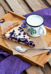 Obraz na płótnie Canvas Homemade blueberry tart pie and milk