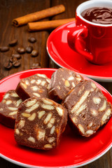 Chocolate salami with hot chocolate and cinamon