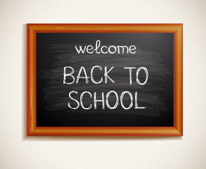 Back to school written on blackboard