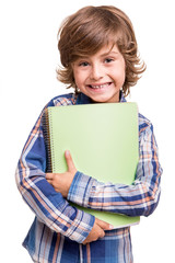 Boy holding school books