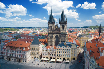 Obraz premium Houses with traditional red roofs in Prague Old Town Square in t