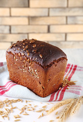 Fresh bread on wooden table, close up