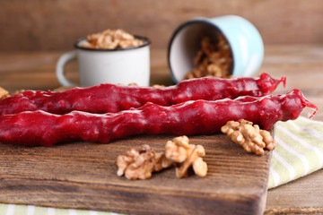 Tasty oriental sweets (churchkhela) and fresh nuts,