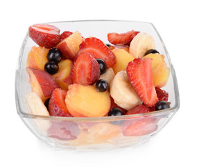 Fresh fruits salad in bowl isolated on white