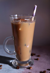 Glass of iced milk coffee
