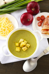 Leek soup on table, close up