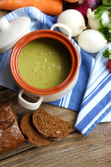 Leek soup on table, close up