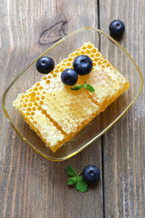 Fresh honey on wooden table