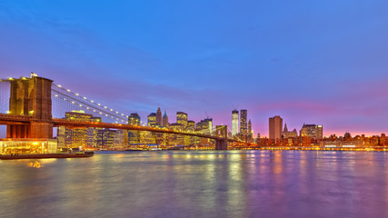 Fototapeta na wymiar Brooklyn bridge and Manhattan at dusk