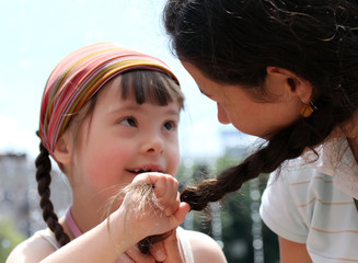 Happy family moments - Mother and child have a fun