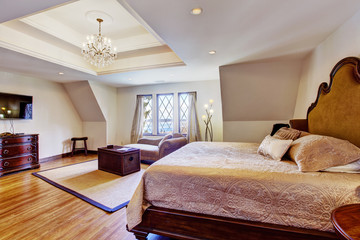 Bright luxury bedroom with design ceiling