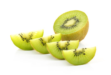 Whole kiwi fruit and his sliced segments isolated on white backg