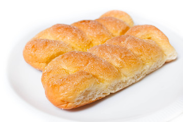 Sweet buns with butter and sugar.