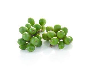 green coffee beans isolated on white background