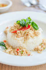 Spicy fried chicken with basil and rice