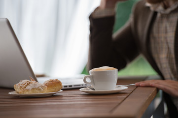 Businessman working cafe laptop