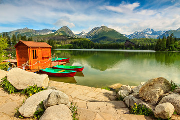 Colorful boats and hut on the lake,Strbske Pleso,Slovakia,Europe