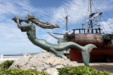 Mermaid sculpture at historic ship in Santander, Spain - obrazy, fototapety, plakaty