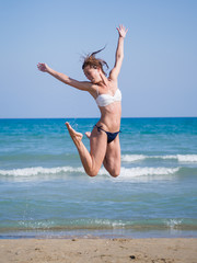 young woman relaxing on the beach