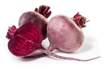 Fresh beetroot with half isolated on white