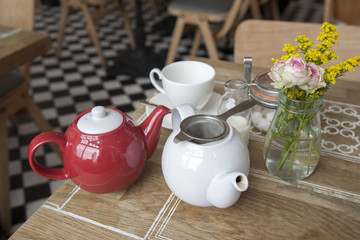 Tea Pots, with Cup and Saucer