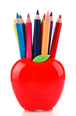 Colorful pencils in apple shaped stand