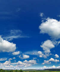 Obraz premium rural landscape with blue sky and clouds