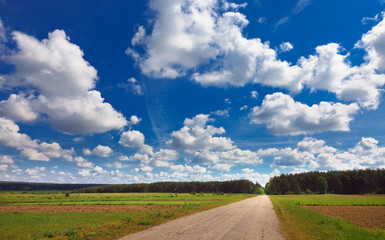 rural landscape with road and clouds
