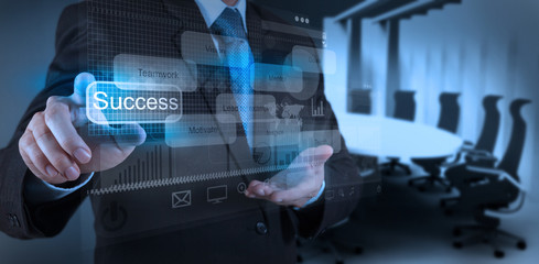 businessman hand draws business success chart