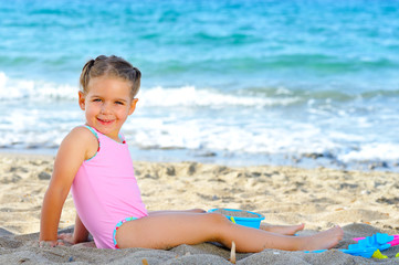 Toddler girl at beach