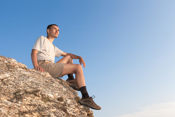 Tourist on the rock