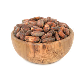 Cocoa beans in a wooden bowl