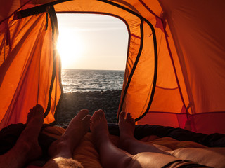 people camping near sea
