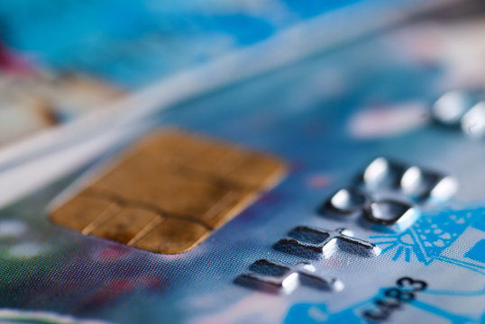 Close up of blue credit card with chip