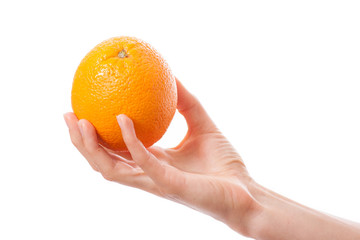 orange in a female hand