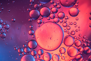 Abstract bubbles of water forming like asteroids