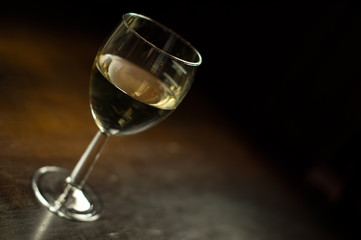 Chilled white wine in a glass , with copy space