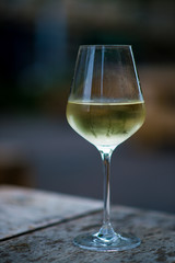 Chilled white wine in a glass , with copy space