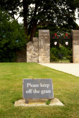 Old "please keep off the grass" sign in Oxford, England