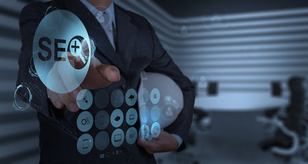 businessman hand showing search engine optimization SEO