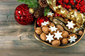 christmas decorations with cinnamon star cookies and walnuts