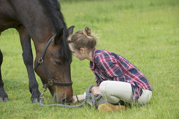 Young girl with her pony,