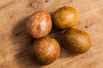 Fototapeta premium Passion fruits on wooden background.