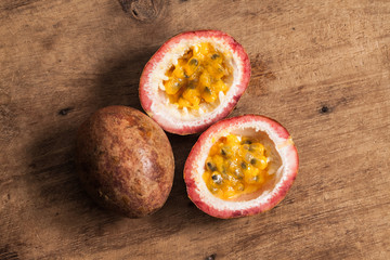 Passion fruits on wooden background.