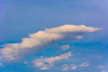 Naklejka na ściany i meble Beautiful clouds on the blue sky background