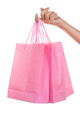 Woman hand holding gift bag