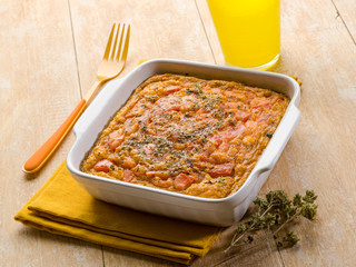 eggs quiche with tomatoes and oregano