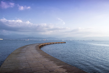 Blue Sea and Wooden Port