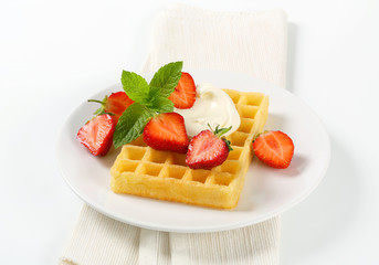 Crisp waffle with fresh strawberries